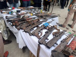 Dismissed Immigration Officer Nabbed Attempting to Sell Guns to Bandits in Abuja